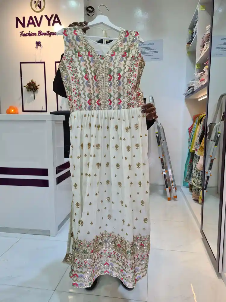Twara grey intricate design printed, glitter work & neck work rayon 3/4th  sleeve naira-cut long kurti